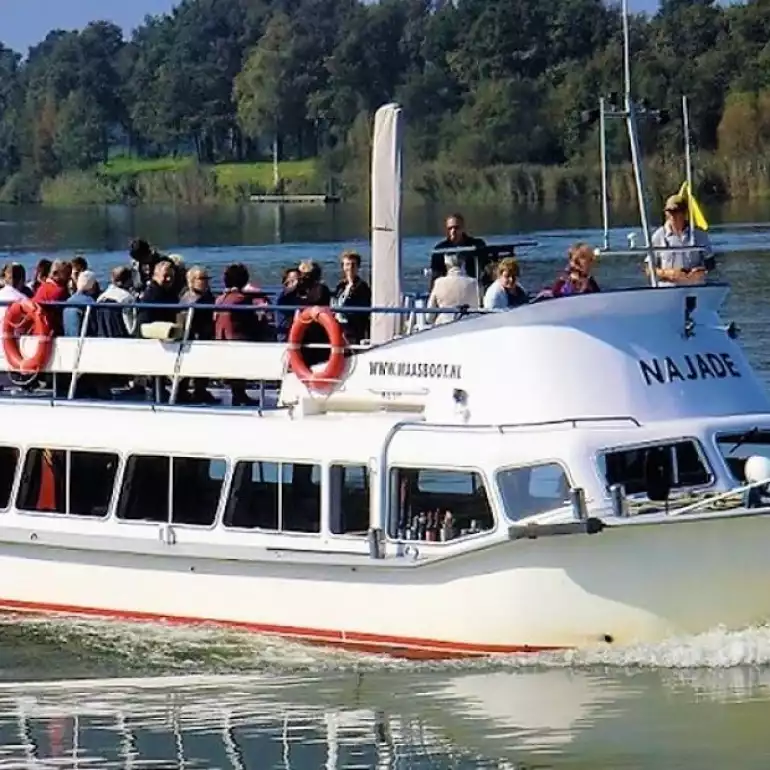 Large group of people enjoying the privacy of a private boat hire.